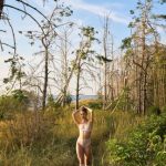 Beautiful skinny babe Amelie Lou strip teasing out in the wilderness in “Run Free Part II” by Amelie Lou Official_6858ef1842376.jpeg