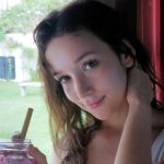 Cute perky teen Ellie Leen stripping thong panties off on patio in “Cute As Fuck” by Wow Girls_685a8a2d24e31.jpeg