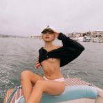 Gorgeous white haired lady Lennon Elizabeth strip teasing on a boat in “Out At Sea” by Playboy Plus_6858efbe14327.jpeg