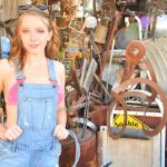 Young and pretty redhead Elodie suddenly flashes her tits in the garage in “Garage Girl” by FTV Girls_6858e8ca7a651.jpeg