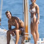Sydney Sweeney & Glen Powell Swim Out to a Yacht Filming a New Movie in Sydney (144 Photos)_686e9d5e9c41c.webp